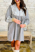 Black stripe dress with detailed back!