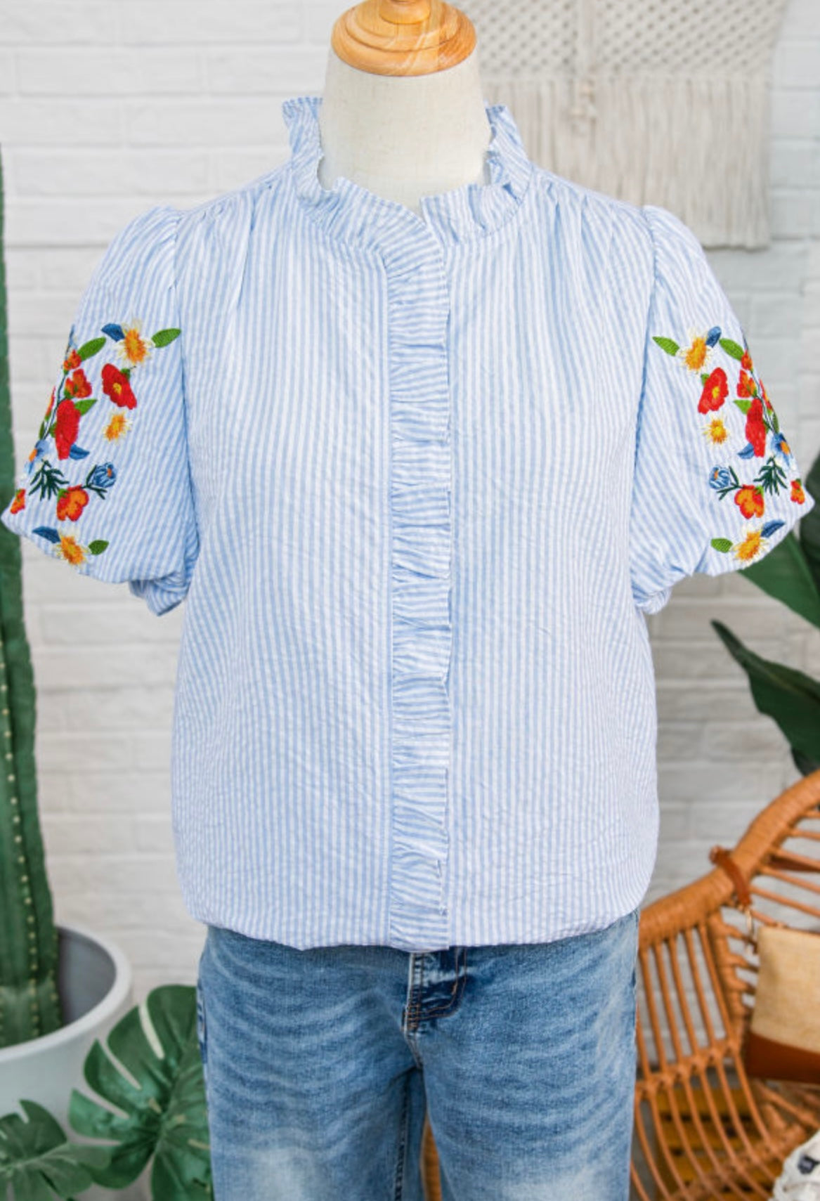 Sky blue ruffle trim embroidered top