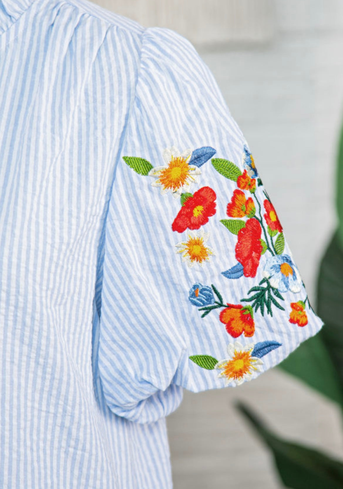 Sky blue ruffle trim embroidered top